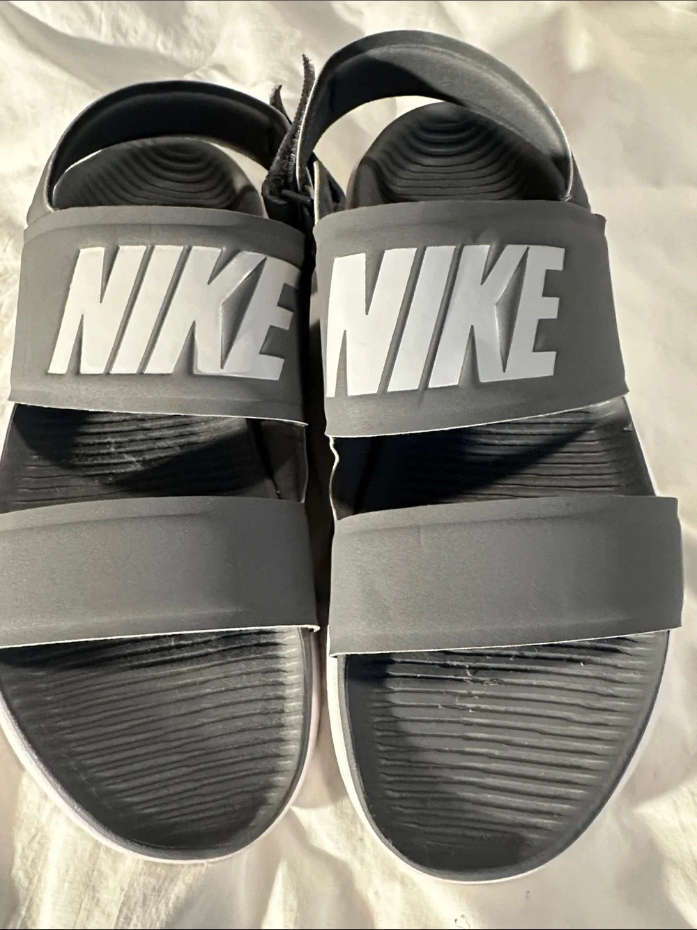 Nike Gray and White Slide Sandals with Subtle Branding